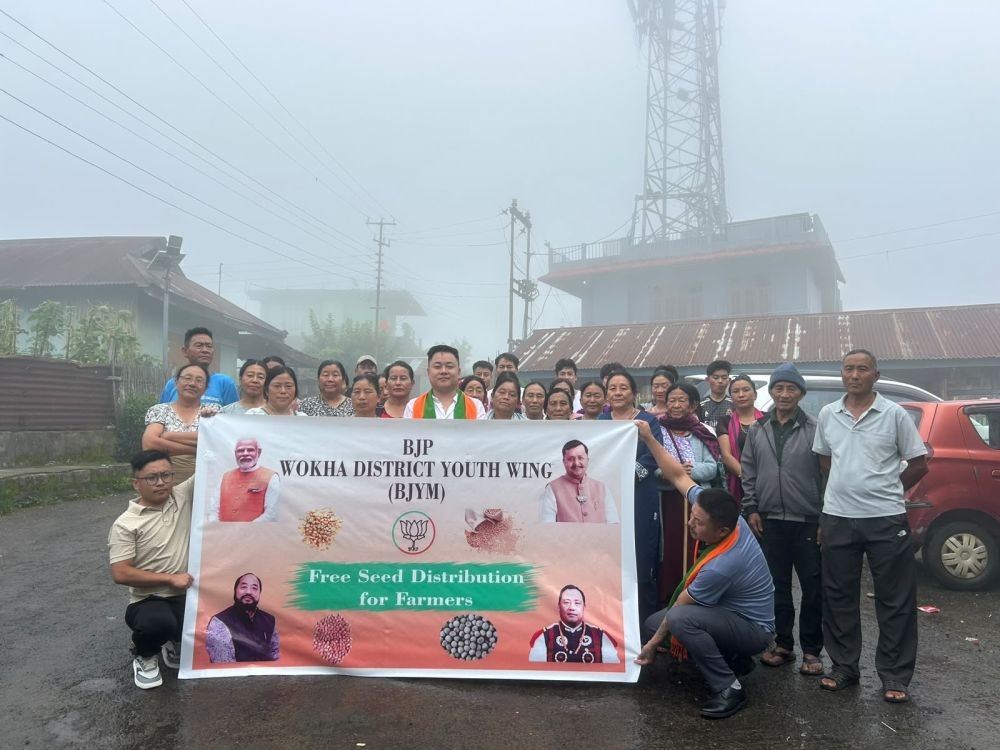 Members of Wokha District BJP Youth Wing and others during the free seed distribution programme at Longsa Village on July 1. (Morung Photo)