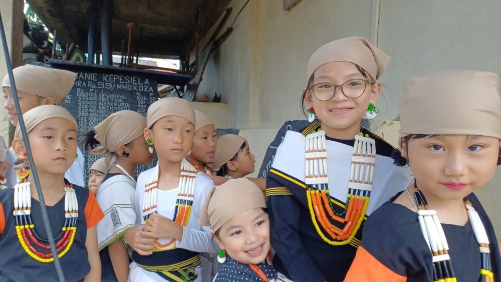 Jubilant children in their traditional attire during Telkhukhu Nyi 2026 at Viswema on July 27.