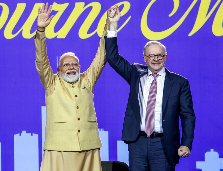 Prime Minister Narendra Modi with Australian Prime Minister Anthony Albanese during the Indian community event in Melbourne, Australia, on July 9/ (IANS/PMO Photo)