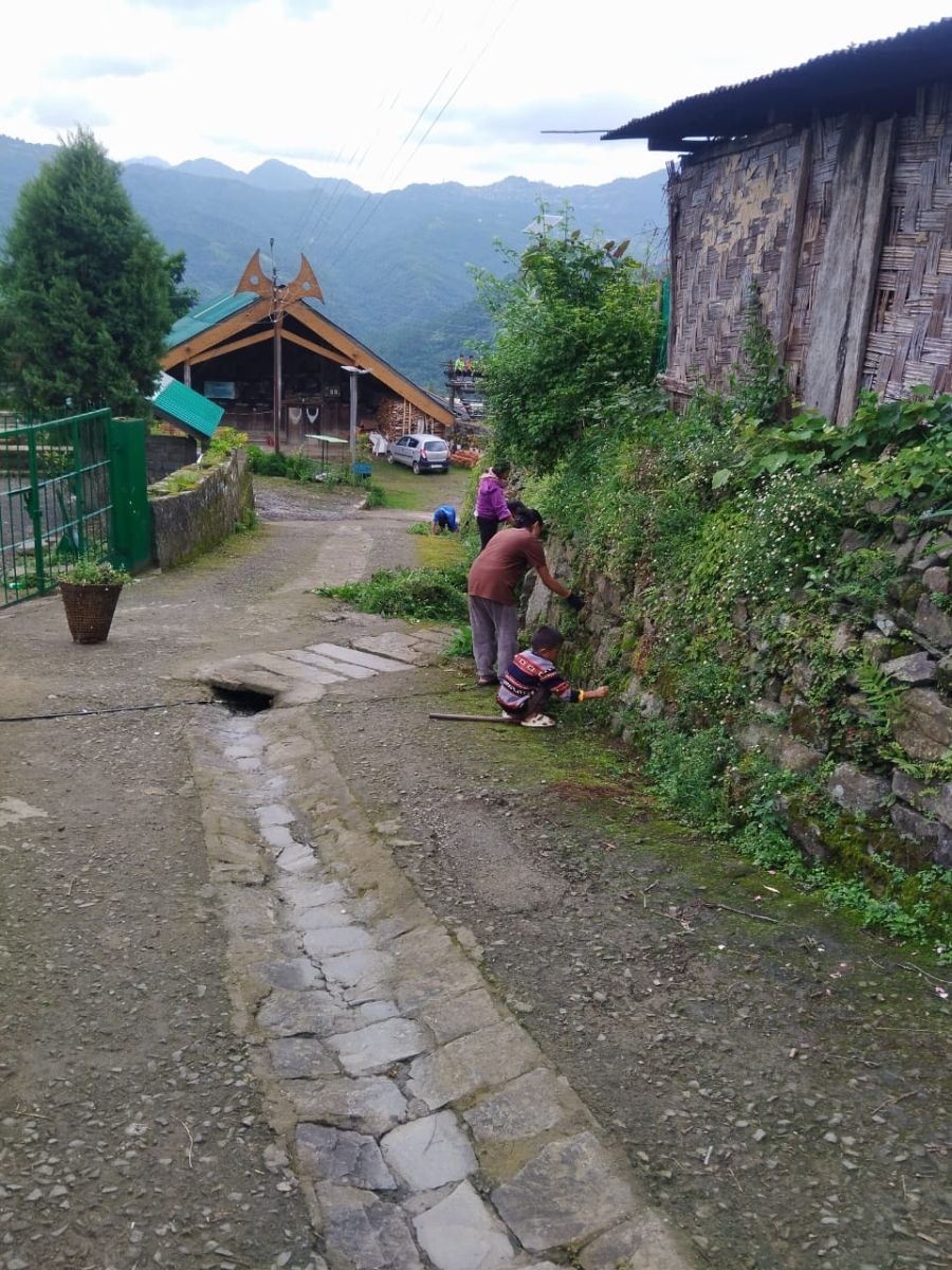 Participants take part in the Sanitation Day drive held across ZAPO jurisdiction in Phek district on July 18.