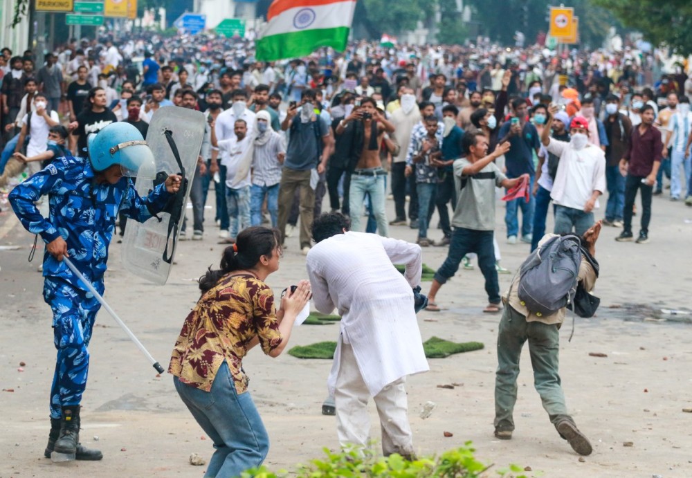 New Delhi: Police personnel try to stop supporters of the Cockroach Janta Party (CJP) as they march towards Parliament during the party’s ‘Chalo Sansad’ protest near Jantar Mantar in New Delhi on Monday, July 20, 2026. (Photo: IANS/Qamar Sibtain)