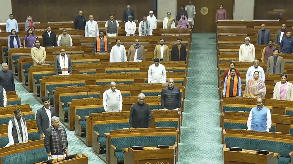 Members of Parliament stand for ‘Vande Mataram’ in the Lok Sabha during the Winter Session of Parliament in New Delhi, on December 19, 2025. (IANS File Photo)