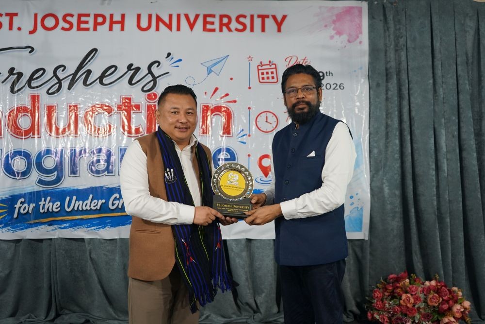 Special Guest Tongpang L Jamir being was presented a token of appreciation by Dr D Gnanadurai, Vice-Chancellor, SJU.