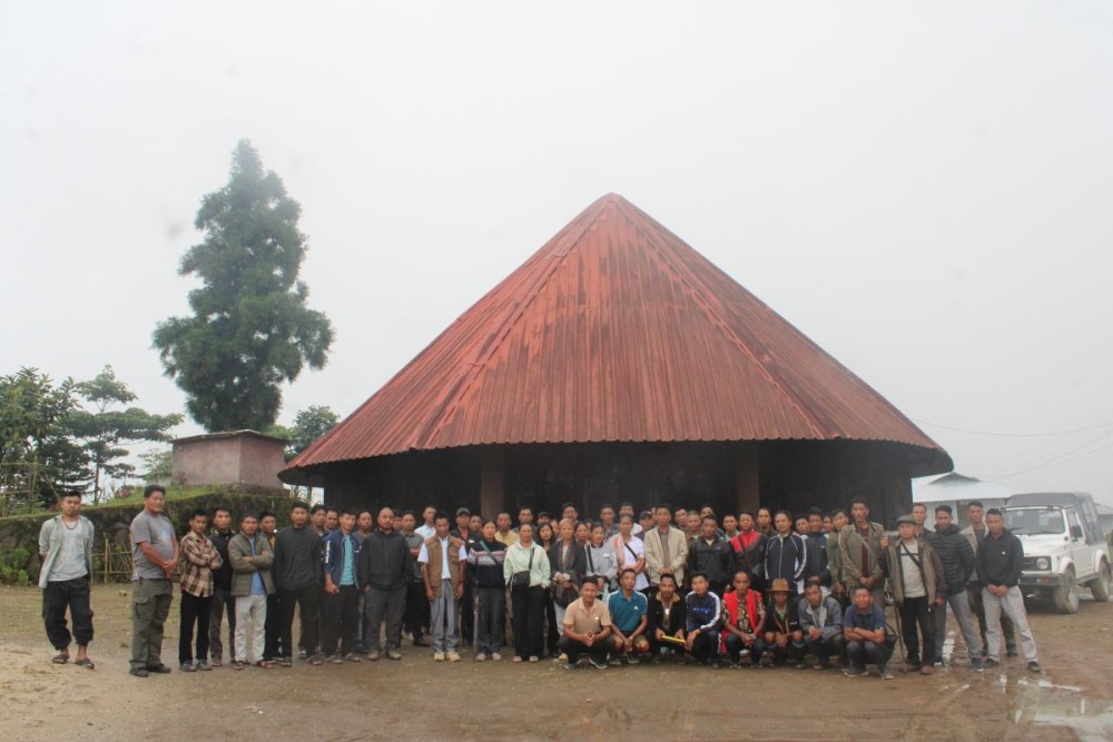 Representatives of the Longwa village pose for a photo following the declaration of war against drugs on August 2 in Mon.