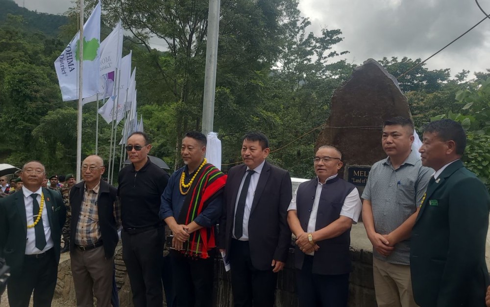 MLAs Z Nyusietho Nyuthe and Dr Tseilhoutuo Rhütso, Kohima DC B Henok Buchem and others during the unveiling of the Meluri District Unity Stone Monolith on August 26. (Morung Photo)