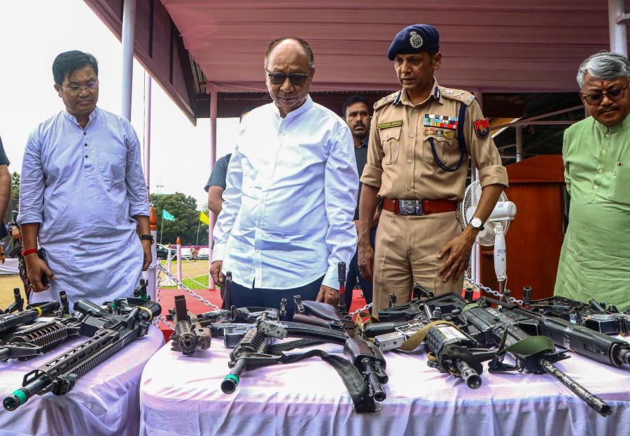 Manipur Chief Minister Yumnam Khemchand Singh inspects arms and explosives recovered by security forces during a programme on initiatives towards bringing normalcy in Manipur, at the 1st Battalion MR Parade Ground, in Imphal on August 12, 2026. (IANS Photo)