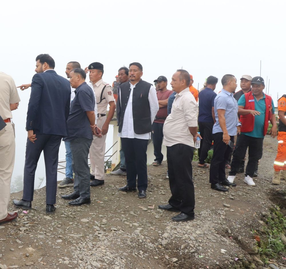 Lok Sabha MP S Supongmeren Jamirm inspects the landslide-affected stretch of National Highway-702A at New Colony, Zunheboto along with other officials on August 20.  (Morung Photo)