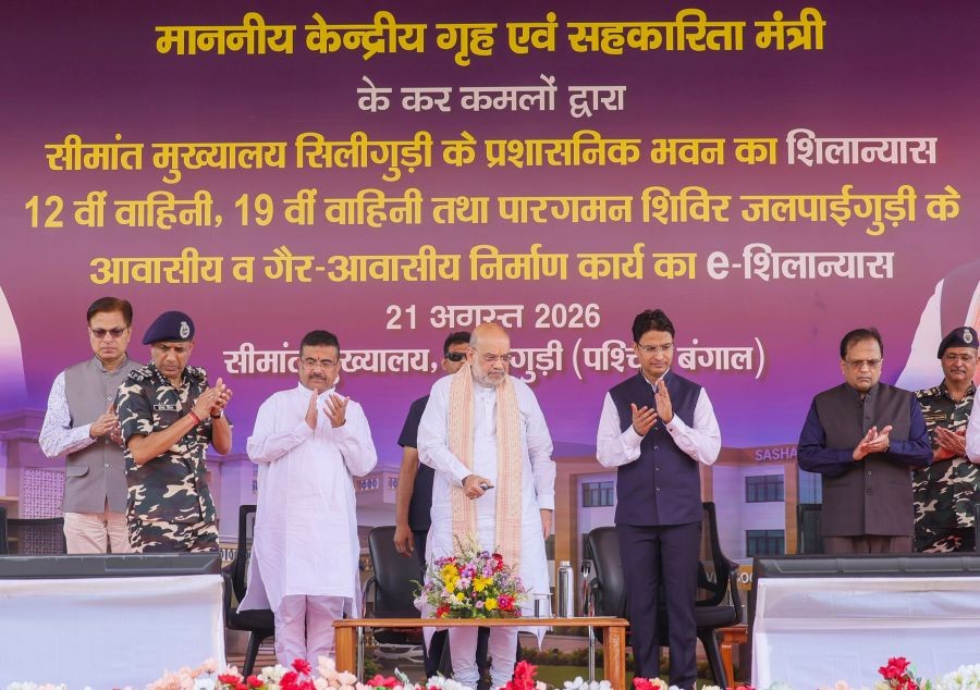 Union Home Minister Amit Shah along with West Bengal Chief Minister Suvendu Adhikari, Darjeeling MP Raju Bista, Union Home Secretary Govind Mohan and others during the foundation stone-laying ceremony for residential and non-residential construction works of Sashastra Seema Bal (SSB) 12th Battalion, 19th Battalion and Transit Camp, Jalpaiguri, in Siliguri on August 21, 2026. (IANS/X/@AmitShah Photo)