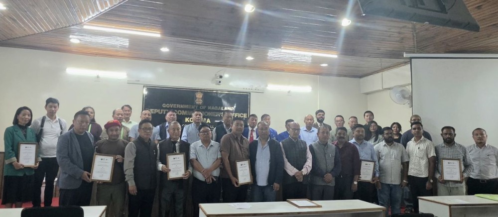 Deputy Commissioner, Kohima, B Henok Buchem and Thejao Vihienuo, President, Angami Public Organisation seen with the NGOs/CSOs who were presented with Certificates of Appreciation, along with other Officials at Kohima DC's Office on August 21.