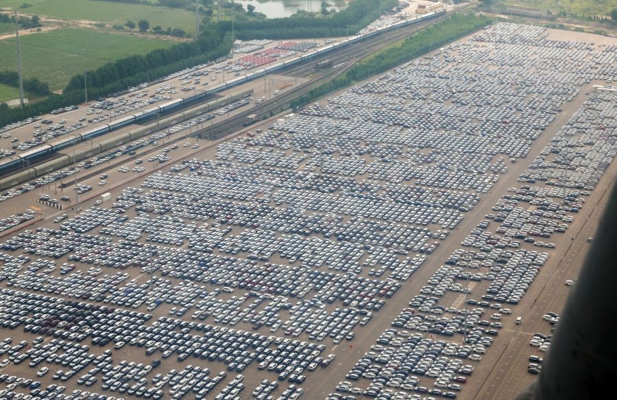 A view of vehicles lined up at the Suzuki Motor Plant in Hansalpur during the inauguration of green mobility initiatives by Prime Minister Narendra Modi (unseen), in Ahmedabad, Gujara. (IANS/PMO File Photo)