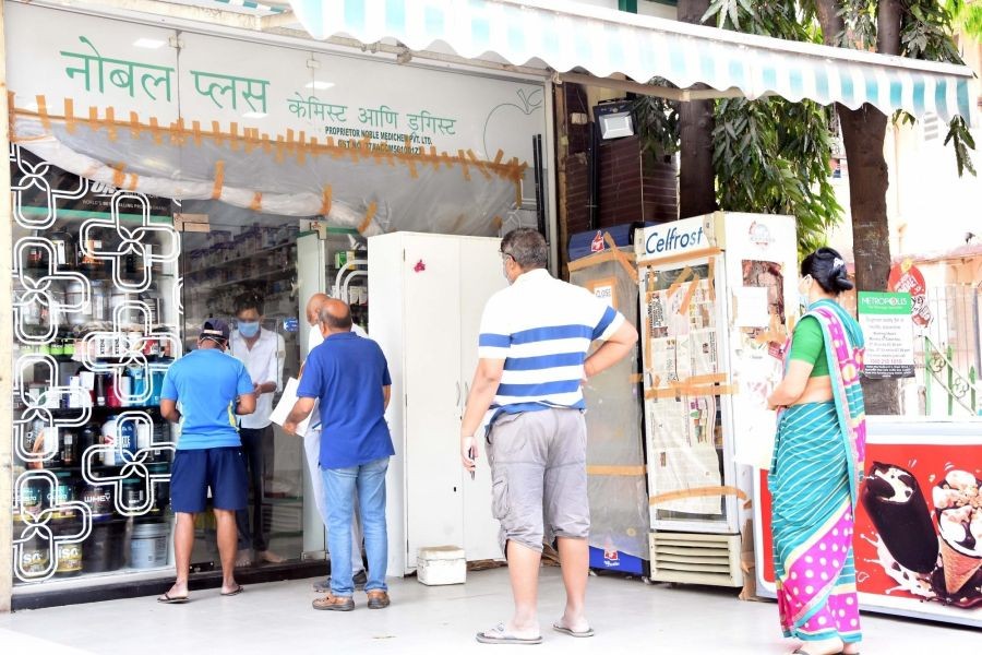 People stand in a queue while practising social distancing outside a medical store on Day 2 of the 21-day nationwide lockdown imposed by the Narendra Modi government over the coronavirus pandemic; in Mumbai on March 26, 2020. (Photo: IANS)
