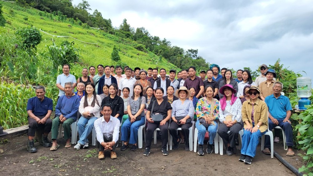 Officials and staff of Agriculture Department, Kohima, villagers at Kezoma Baptist Church Millet farm during the commissioning of water sprinklers and pumps for winter crops on September 23. (Morung Photo)