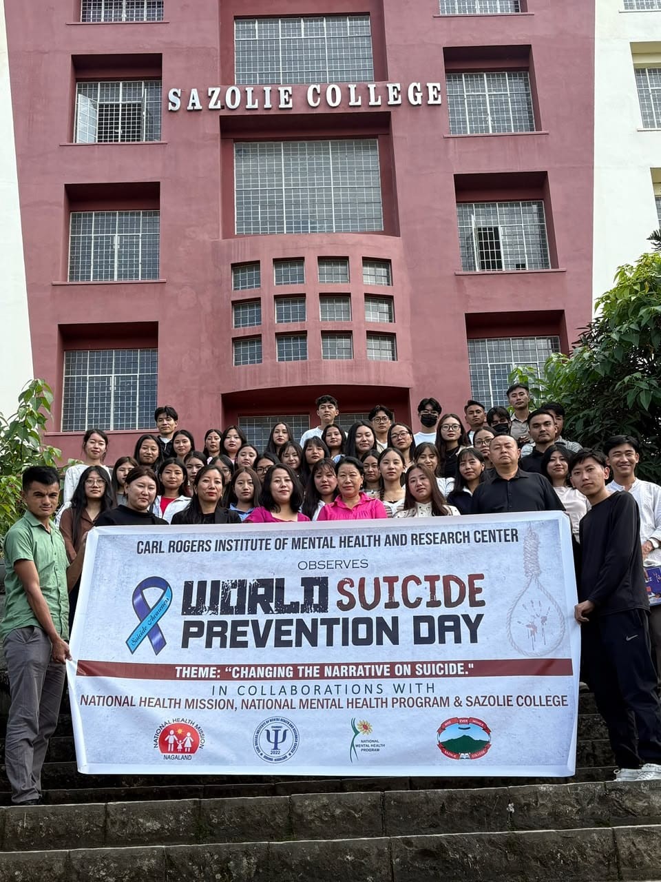 Officials with participants of World Suicide Prevention Day at Sazolie College.