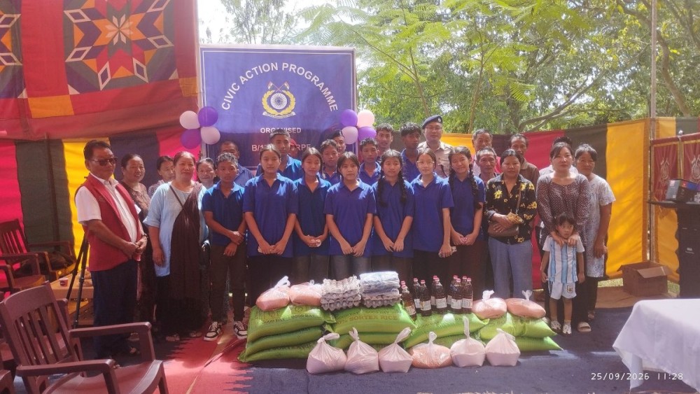 Beneficiaries with the aid items handed out by the Bravo Company, 173rd Battalion, CRPF, stationed at the CIHSR, Chümoukedima, on September 24. (Morung Photo)