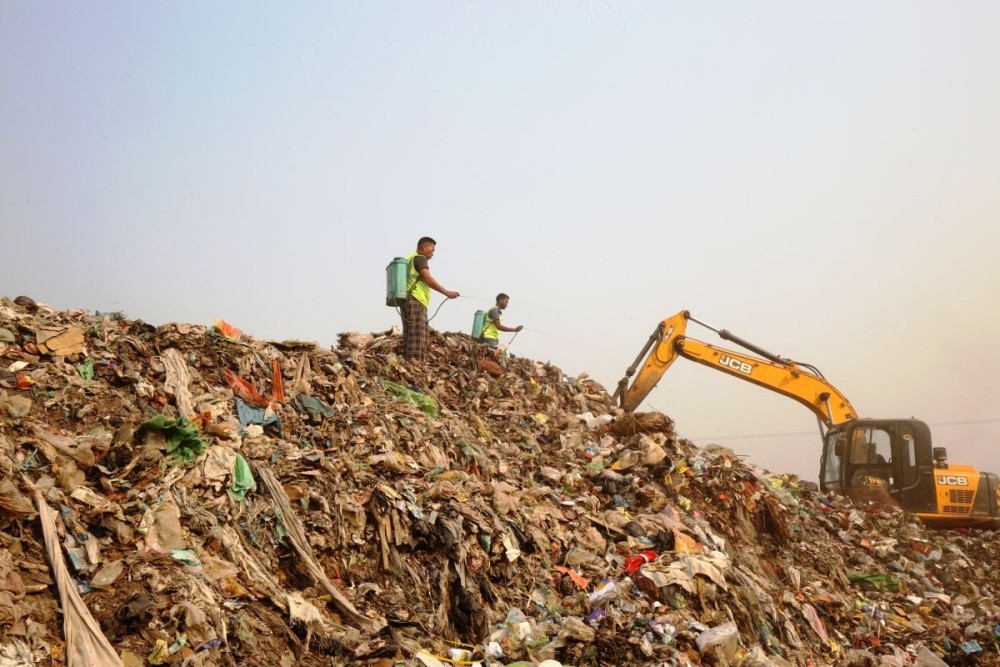 Workers at the Dimapur Municipal Council dumping site. As per the Nagaland’s Government submission to NGT, out of 1,61,110 MT  legacy waste to be remediated in Dimapur,  80555 had been remediated in Dimapur as of September 5, 2026. (Morung File Photo)
