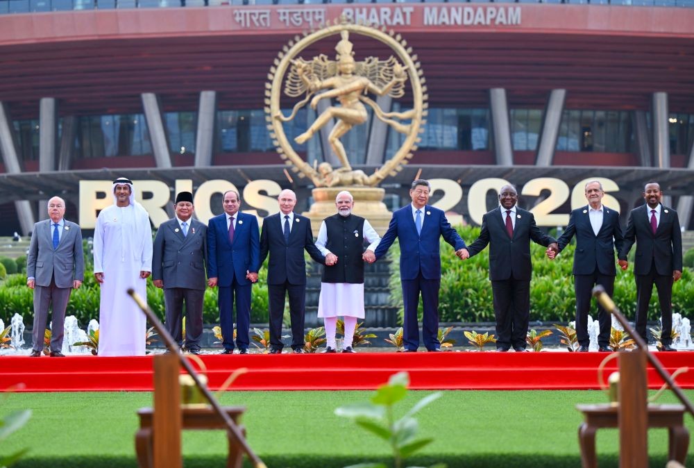 (From L to R) Minister of Foreign Affairs of Brazil Mauro Vieira, Indonesian President Prabowo Subianto, Egyptian President Abdel Fattah el-Sisi, Russian President Vladimir Putin, Prime Minister Narendra Modi, Chinese President Xi Jinping, South African President Cyril Ramaphosa, Iranian President Masoud Pezeshkian and Ethiopian Prime Minister Abiy Ahmed Ali in a group photograph during the 18th BRICS Summit at Bharat Mandapam in New Delhi on September 12, 2026. (IANS/MEA Photo)