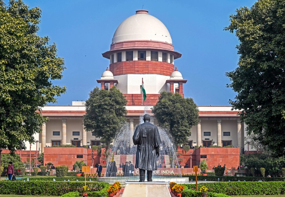 New Delhi: A general view of the Supreme Court of India standing tall under a clear sky, in New Delhi, Monday, January 05, 2025. (Photo: IANS/Deepak Kumar)