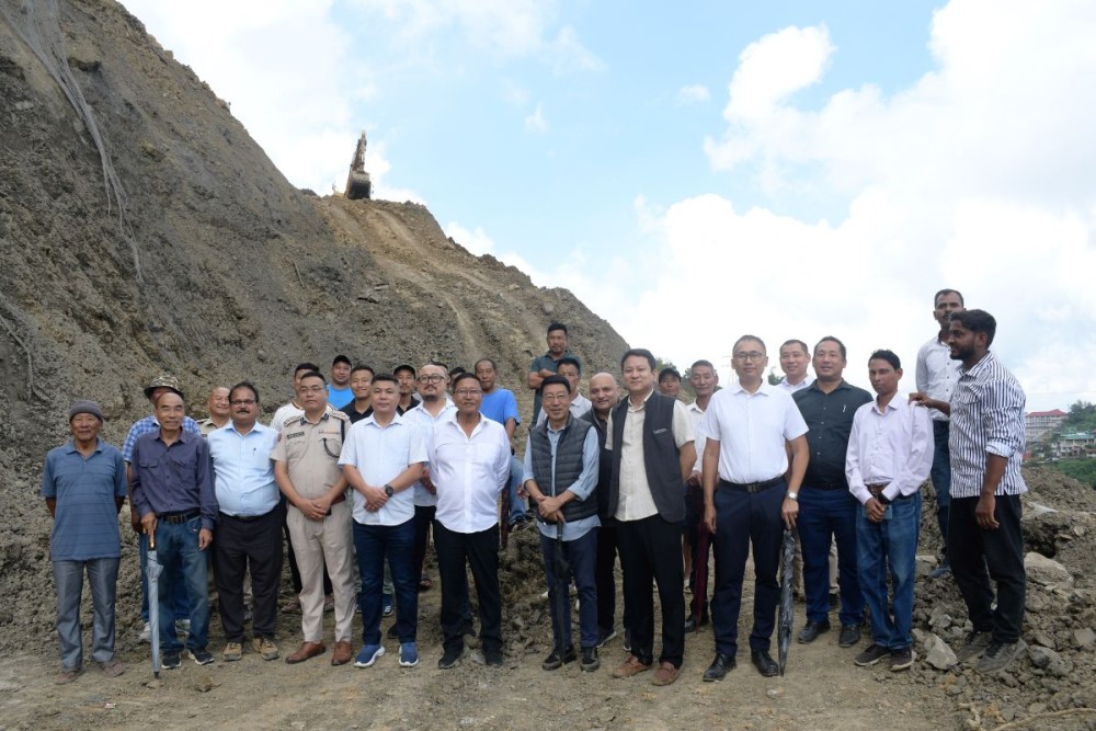 MLA Kevipodi Sophie, DC Kohima B Henok Buchem, officials and village leaders inspect the landslide restoration work at Phesama on September 28.