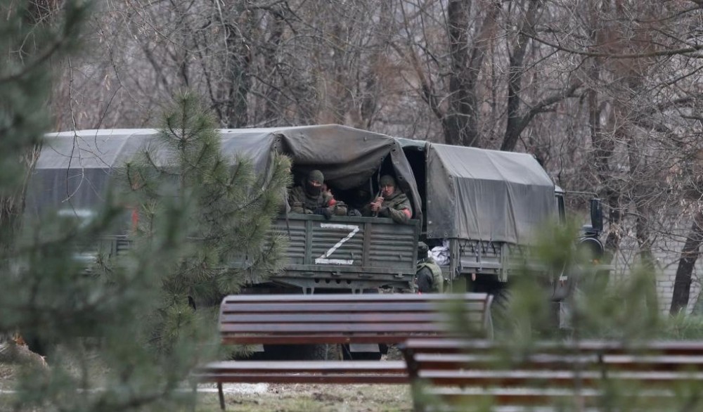 Photo taken on March 1, 2022 shows armed personnel in Donetsk. (Photo by Victor/Xinhua/IANS)