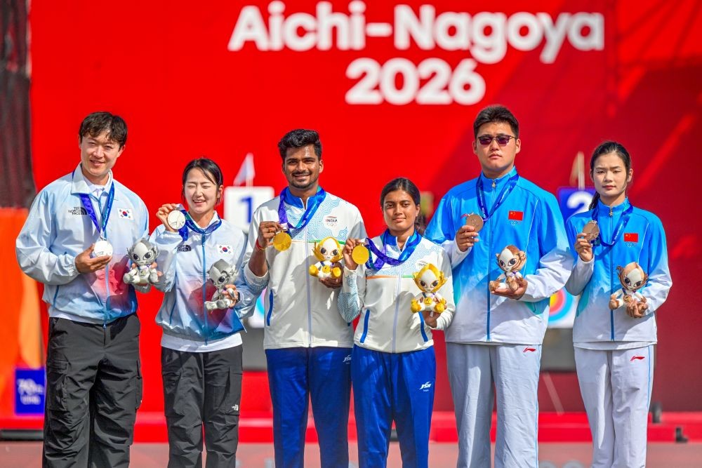 Gold medallist Sahil Jadhav and Chikitha Taniparthi of India, silver medallists Park Jungyoon and Choi Yonghee of South Korea and bronze medallists Liu Jinyi and Wei Fangyao of China pose for photos during the medal ceremony of the compound mixed team archery event at the Asian Games 2026 in Aichi, Japan, on September 30, 2026. (Photo: IANS/Biplab Banerjee)