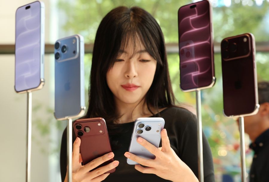 A customer views iPhone 18 series smartphones at an Apple outlet as the new iPhone models hit the South Korean market, in Seoul, South Korea, on September 18, 2026. (Photo: Yonhap via IANS)