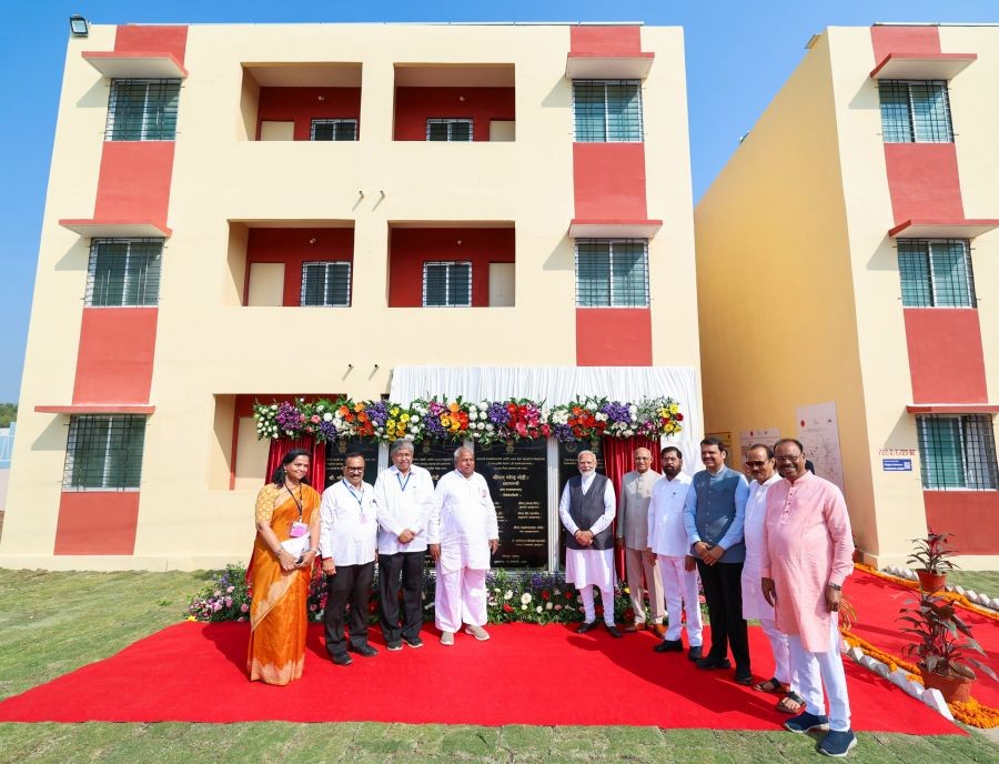 Prime Minister Narendra Modi with Maharashtra Governor Ramesh Bais, Chief Minister Eknath Shinde and Dy CMs Devendra Fadnavis and Ajit Pawar during dedication of the houses built under PMAY-U scheme, in Solapur, Maharashtra. (IANS/PIB File Photo)