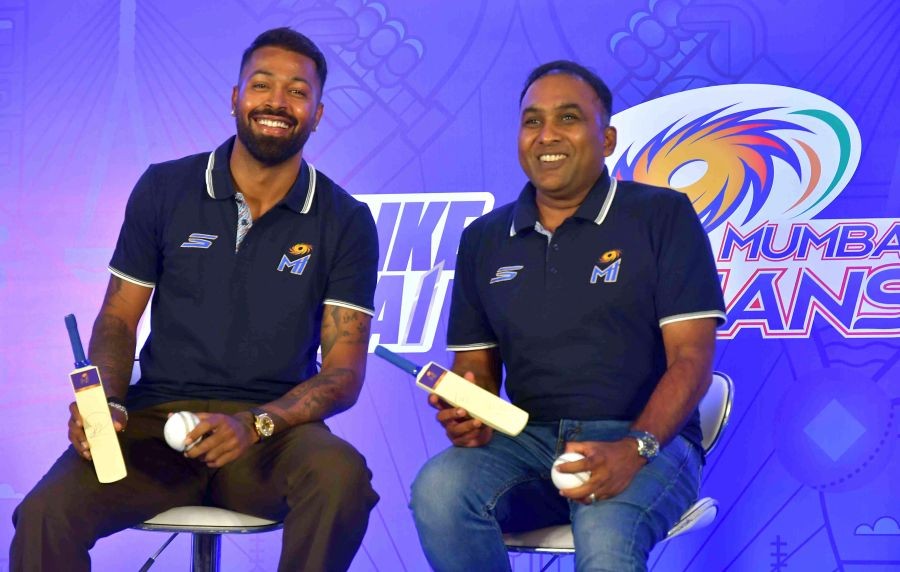 Mumbai Indians captain Hardik Pandya and head coach Mahela Jayawardene during the pre-season press conference ahead of IPL 2025 in Mumbai on March 19, 2025. (IANS File Photo)