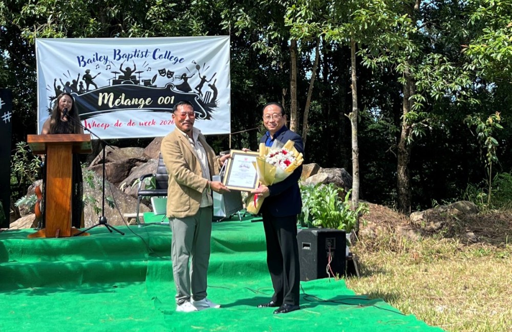 DC Wokha, K Mhathung Tsanglao, being felicitated during the inaugural programme of ‘Milange, Whoop de Do Week 2026’ at Bailey Baptist College, Wokha on October 12. (Morung Photo)