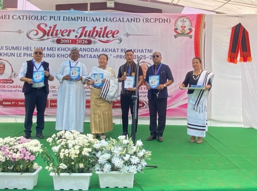NSDMA Joint CEO Johnny Ruangmei (left), Chancellor of Kohima Diocese Rev Fr Dr Jacob Charalel (second from left),  NCWA president Ruokuoheu Roselyn Minchieo (third from left), CAN President Jonas Yanthan (second from right) and others on the second day of the RCPDN silver jubilee on October 2,  in Mhainamtsi village, Peren. (Morung Photo)