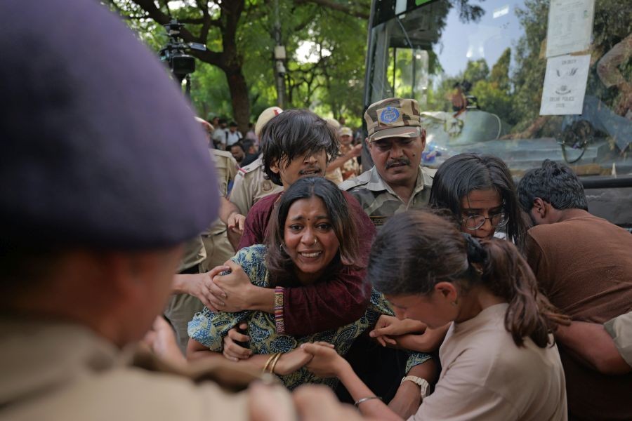 Delhi Police personnel detain activists during a protest against Chief Election Commissioner (CEC) Gyanesh Kumar, demanding his resignation over the alleged irregularities in the Special Intensive Revision (SIR) of electoral rolls and mass deletion of voters, at Jantar Mantar in New Delhi on October 3, 2026. (Photo: IANS/Deepak Kumar)