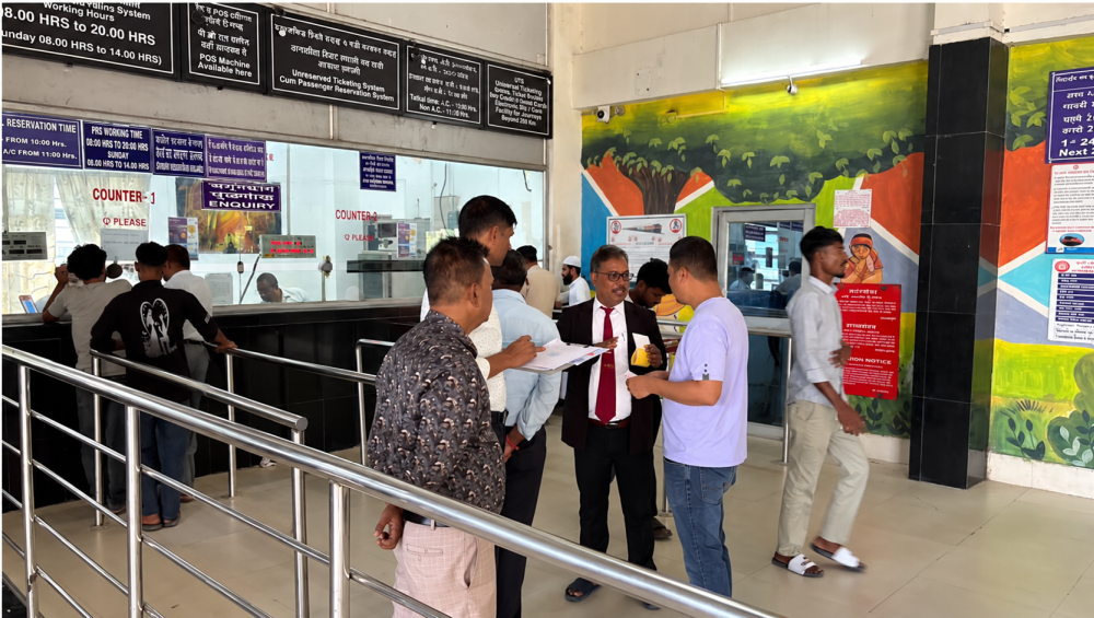 Railway officials interact with passengers at a station concourse to collect feedback during the 'Rail Jan Samvaad' drive organised by the Northeast Frontier Railway on October 22.
