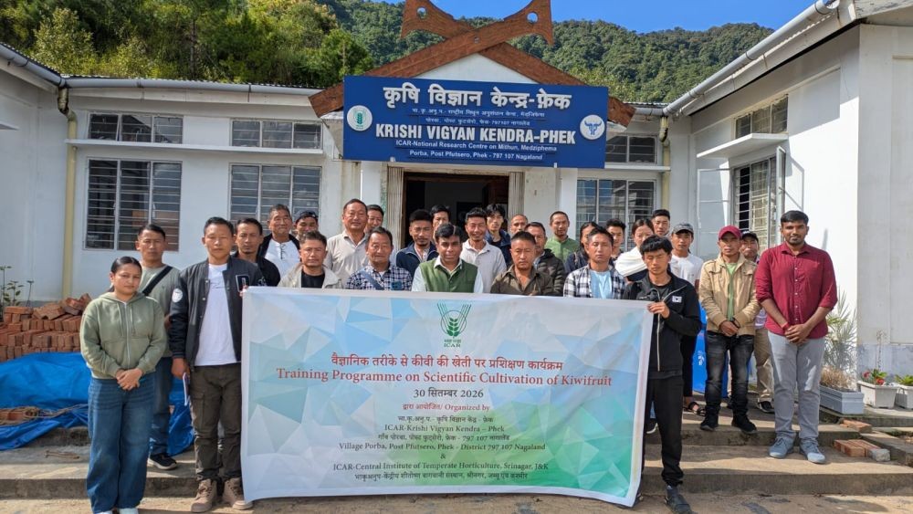 Organisers, resource persons, and participating farmers pose for a photo with the banner during the training programme on scientific cultivation of kiwifruit at ICAR-KVK, Phek, on September 30.