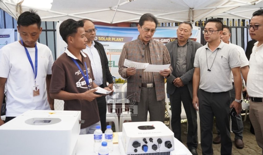 Minister KG Kenye (centre) interacts with vendors and officials during the second day of the ongoing Seva Setu Abhiyan at Secretariat Junction in Kohima on October 15. (DIPR Photo)