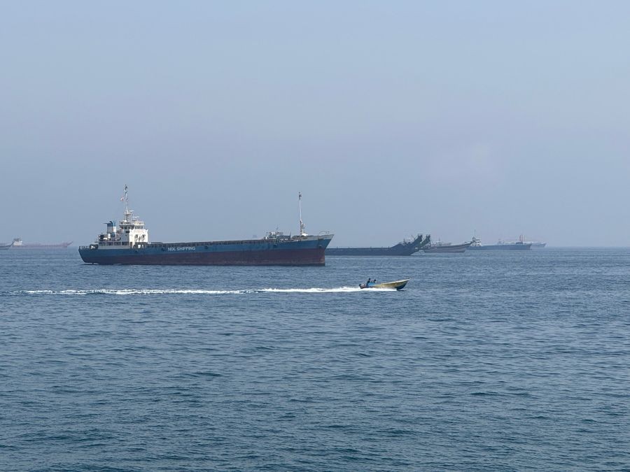 This photo taken with a mobile phone shows merchant vessels stranded in the waters of the Strait of Hormuz, near Khasab, a small town in northern Oman, May 29, 2026. (Photo: Xinhua via IANS)