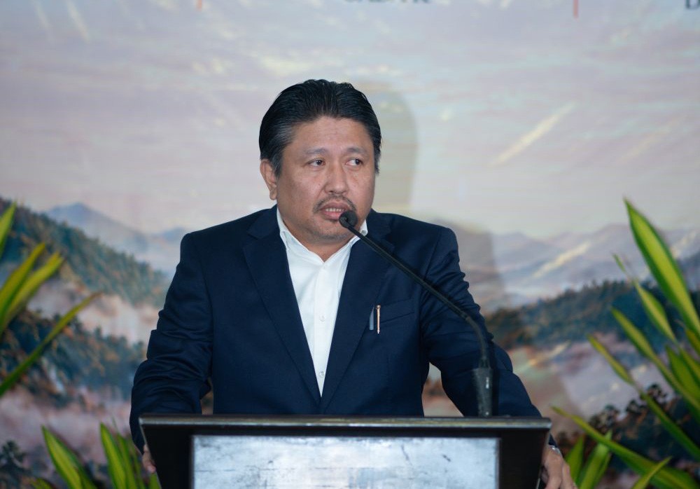 Minister Jacob Zhimomi addresses the 35th Biennial Session of the Sümi Baptist Convention at Trinity Theological College, Thahekhü, Dimapur.