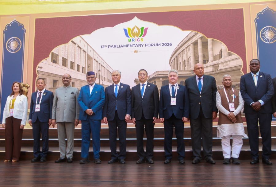 Vice President C.P. Radhakrishnan, Lok Sabha Speaker Om Birla and Deputy Chairman of the Rajya Sabha Harivansh Narayan Singh, along with the delegates, in a group photo session after concluding the 12th BRICS Parliamentary Forum 2026 at the Parliament House Complex, in New Delhi on October 27, 2026. (Photo: IANS/Qamar Sibtain)