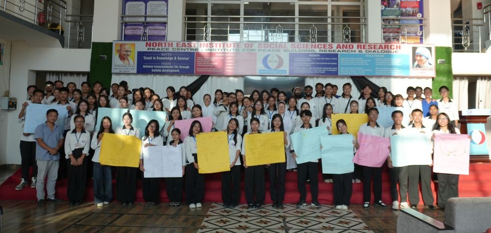 Officials along with the participants pose for a photo during the hands-on workshop on Participatory Rural Appraisal (PRA) at NEISSR, Chümoukedima on October 23.