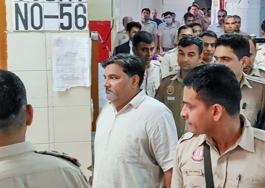 Former Aam Aadmi Party councillor Tahir Hussain is brought to the Karkardooma Court ahead of the pronouncement of the quantum of sentence in the 2020 murder case of Intelligence Bureau officer Ankit Sharma, in New Delhi on July 31, 2026. (Photo: IANS)