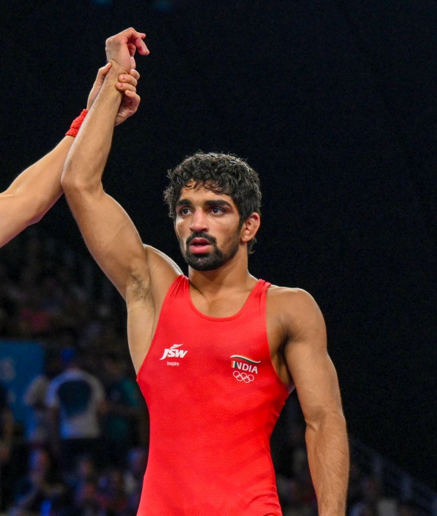 India's Aman Sehrawat defeats North Macedonia's Vladimir Egorov in the round of 16 of the men's freestyle 57kg wrestling match at Champ-de-Mars Arena, during the 2024 Summer Olympics in Paris, France on August 08, 2024.(IANS/Biplab Banerjee)