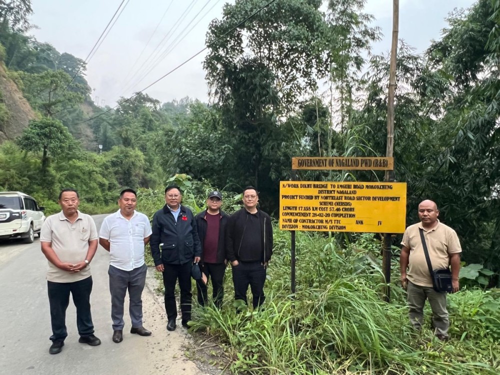 Principal Secretary & Development Commissioner Y Kikheto Sema along with officials and contractors inspecting the Dikhu Bridge-Amguri Road project in Mokokchung district.