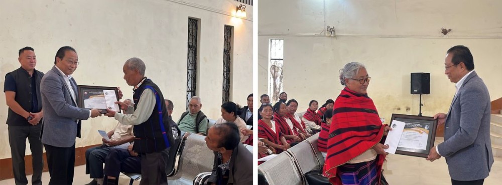 Wokha DC Mhathung Tsanglao presenting the District award for Distinguished Senior Citizens to (left) H Nyanbemo Ngullie and (Right) Nchumbeni Kithan. (Morung Photo)