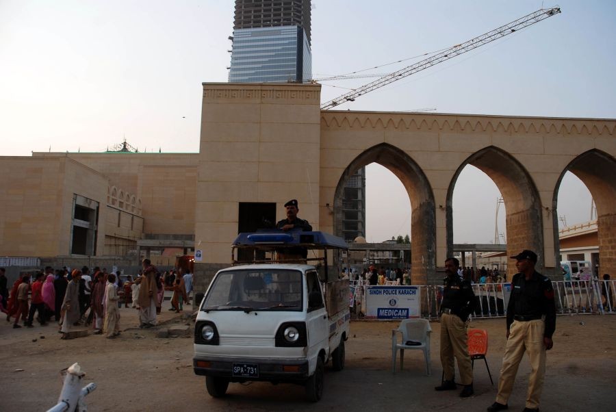 Policemen stand guard outside the shrine of Abdullah Shah Ghazi due to the security high alert after a blast at Shah Noorani Shrine located at a hilltop in Khuzdar district of Balochistan's Kalat region, in southern Pakistani port city of Karachi, Nov. 13, 2016. Xinhua/IANS File Photo)